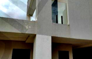 Casa moderna estilo sobrado com 4 suítes e 450m² construídos