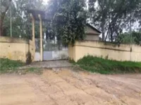 Chácara com 10.000m² de terreno e 1.195m² construídos, ocupada