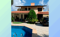 Sobrado de alto padrão com 3 suítes e piscina