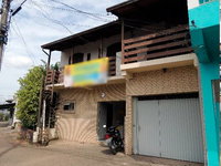 Prédio comercial/residencial em Parobé com 348m² e terreno de 237m²