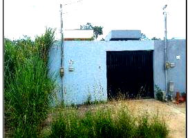 Casa com 64m² privativos e 180m² de terreno, sem informações de ocupação