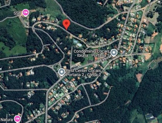 Terreno de 1.804m² com topografia declive acentuado, mata nativa