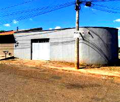 Casa com 3 quartos, 2 banheiros, 180m² construída, ocupada