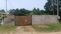 Casa com 3 Quartos, 1 Banheiro e 1 Vaga de Garagem