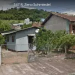 Terreno com 360m² e 2 construções não averbadas