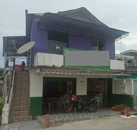 Casa Ocupada com 2 Quartos e 2 Banheiros no Centro