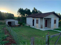 Casa com 1 vaga de garagem, 81,48 m² construídos, ocupada