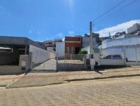Casa com 65m², 1 vaga, ocupada, ideal para investimento