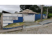Casa em Condomínio Ocupada com 4 Quartos e 2 Banheiros