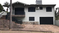 Casa com 3 quartos e 2 banheiros, 127 m², ocupada