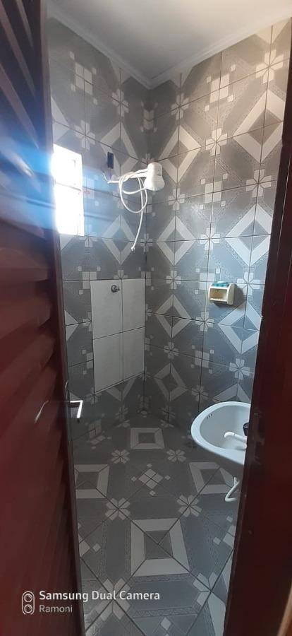 Casa com 3 quartos, 2 banheiros e 138m² construída, ocupada