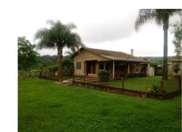 Terreno rural com 837.925 m², galpões e casa antiga