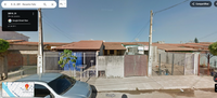 Terreno com casa padrão médio, 2 quartos, garagem coberta para 2 carros