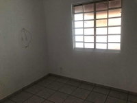 Casa com 3 quartos, 2 banheiros, 131m² construída, ocupada