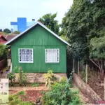 Lote Urbano com 460 m² e Casa de Madeira em Erechim - RS
