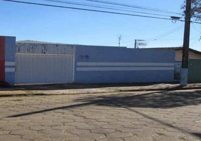 Casa com 3 Quartos, 3 Vagas e 158m² de Área Construída no Centro