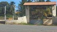 Casa padrão com 3 quartos e 2 banheiros, 553m² construída, ocupada