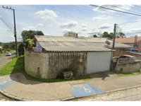 Casa com 72m² construídos em terreno de 481,50m², ocupada