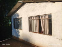 Terreno com casa em alvenaria em Clevelândia/PR