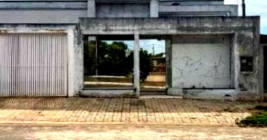Casa espaçosa com 250m² total, 135m² construída e ocupada - Oportunidade de investimento!