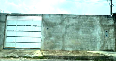 Terreno com 200 m², ocupado, com construção pendente