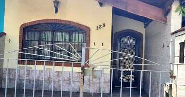 Terreno e Casa Residencial na Praia Grande com 150m²