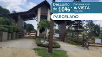 Casa com 651,97m² de área construída em condomínio fechado -