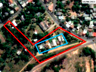 Terreno amplo com 12.240m² e 8 casas invadidas em Rio Pardo/RS