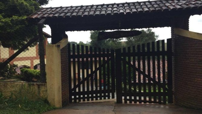 Casa espaçosa com 5 quartos, 5 banheiros e 513 m² construída, ocupada