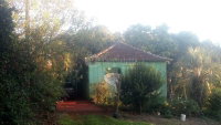 Terreno rural com 21.832,89m², casa e galpão de madeira