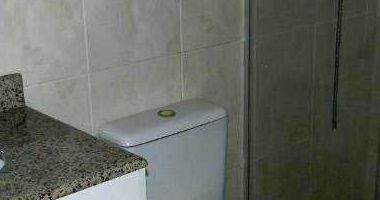 Casa com 3 quartos, 2 banheiros e 91m² construída, ocupada