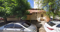 Casa com terreno de 1.000m², 4 quartos, 2 banheiros, ocupada
