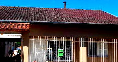 Casa com 3 quartos, 2 banheiros e 1 vaga, 113m² construída, ocupada