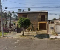 Terreno Urbano com Sobrado em Construção em Gravataí/RS