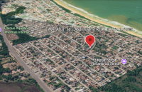 Terreno em Loteamento Praia do Sol com 877m²