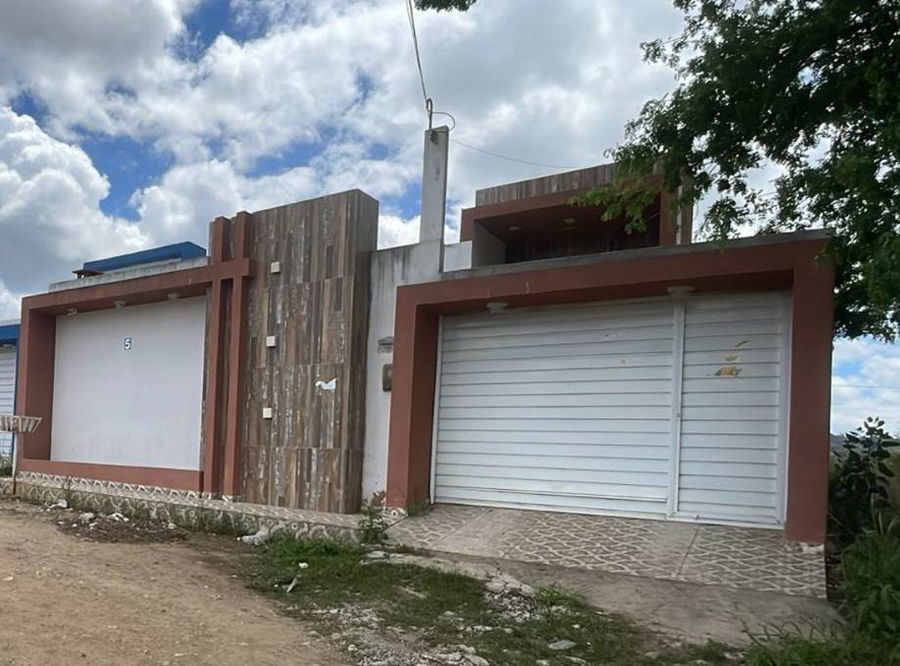 Casa com 3 quartos, 2 banheiros e 124m² construída, ocupada