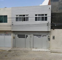 Casa Ocupada no Centro com 3 Quartos e 56m² de Área Construída