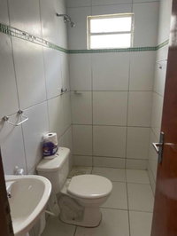Casa padrão com 1 vaga de garagem, 53m² construída, ocupada