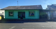 Casa mista de dois pavimentos, 200m² construídos, ocupada