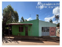 Casa Ocupada com 2 Quartos e 127,95m² de Área Construída