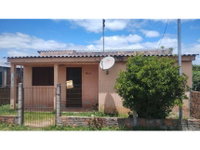 Casa com 38m² construídos, ocupada, terreno de 300m²