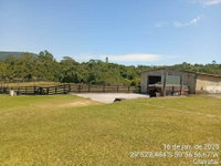 Fração ideal de área rural com 20.000m² e benfeitorias em Gravataí/RS