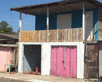 Casa com 100m², 2 quartos, ocupada, ideal para investimento