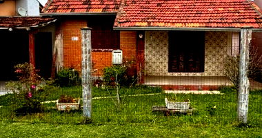 Terreno com casa em Imbé, 139m² construída