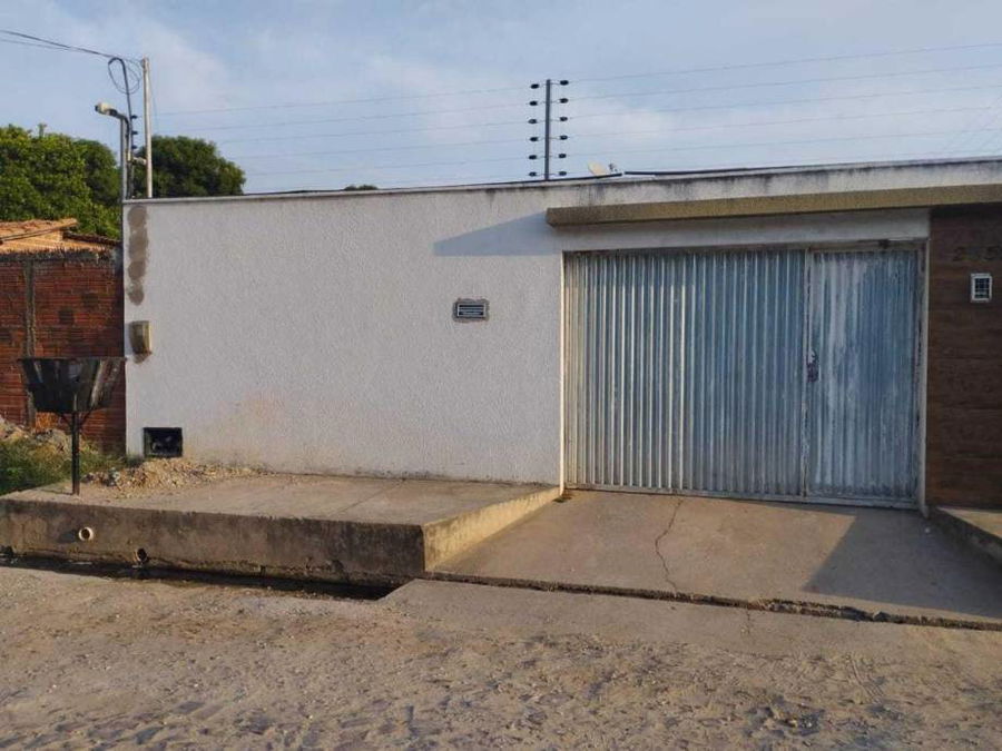 Casa com 3 quartos, 2 banheiros e 125m² construída, ocupada