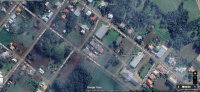 Terreno urbano 555m² com casa de madeira em Boa Vista do Buricá