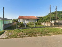 Casa com 60m², 373m² de terreno, ocupada, em Balneário Rincão