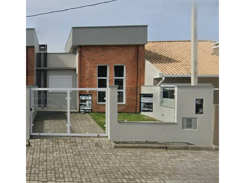 Casa padrão ocupada com 94m² construídos em Imbé/RS
