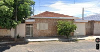 Espaçosa Casa com 7 Cômodos, 515m² de Área Total e Terreno Amplio