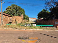 Lote residencial urbano com 450m², murado e edificação inacabada